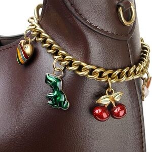 Brown Handbag with Gold Chain and Charms